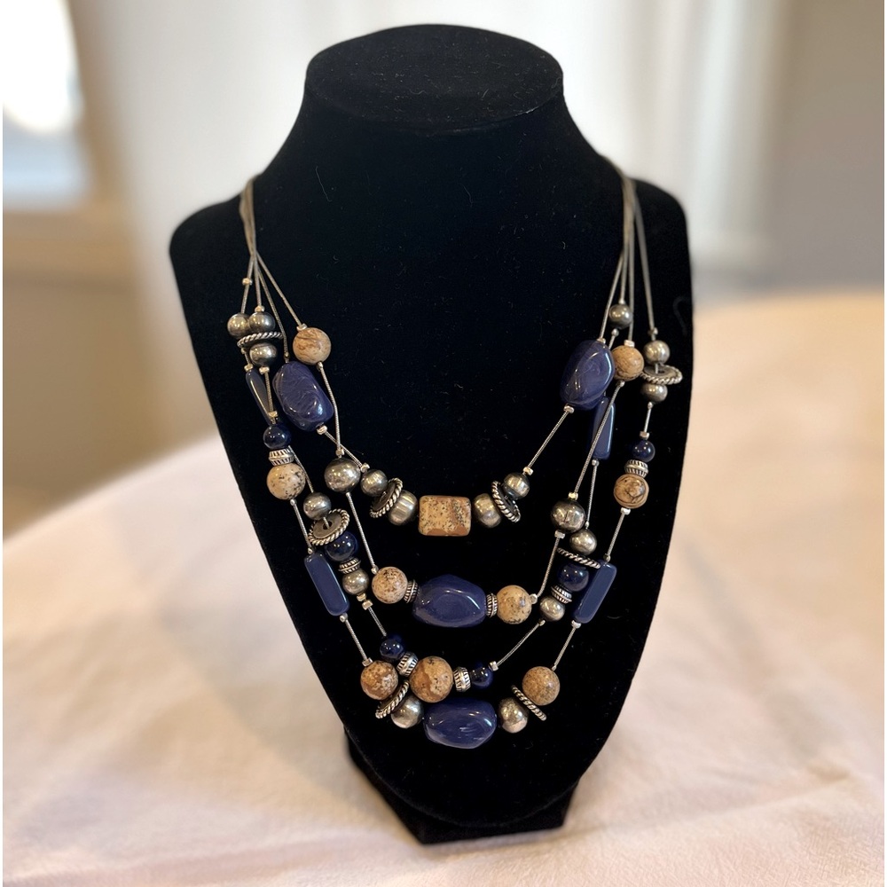 Chico’s necklace 4 strands, blue lapis and neutral colored beads. New condition!